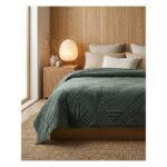 Dormitorio con la manta blanky Hibernar verde