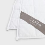 Detalle de la etiqueta y las costuras de la CURA Pearl Classic