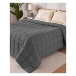 Manta Utopia Bedding sobre una cama